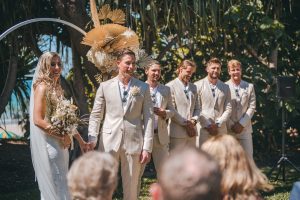 Zoe and Deon with their family and friends at their intimate micro wedding at Maison La Plage, Noosa.