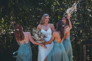 Zoe and Deon with their family and friends at their intimate micro wedding at Maison La Plage, Noosa.